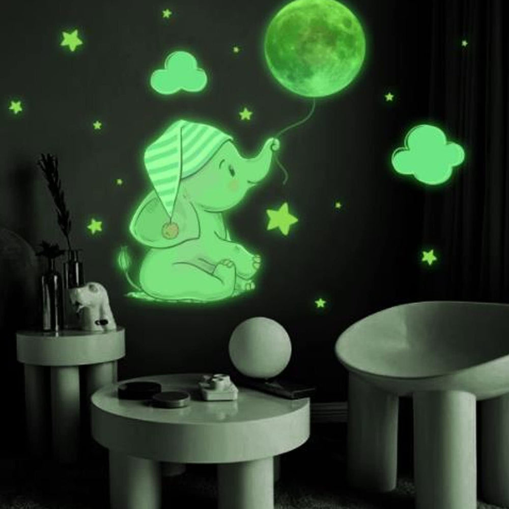 AUNMAS glow wall stickers star illuminate a dreamy bedroom ambiance with soft light.