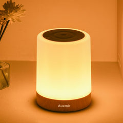 Auxmir night light on a bedside table with dimmable touch control for a calming nursery