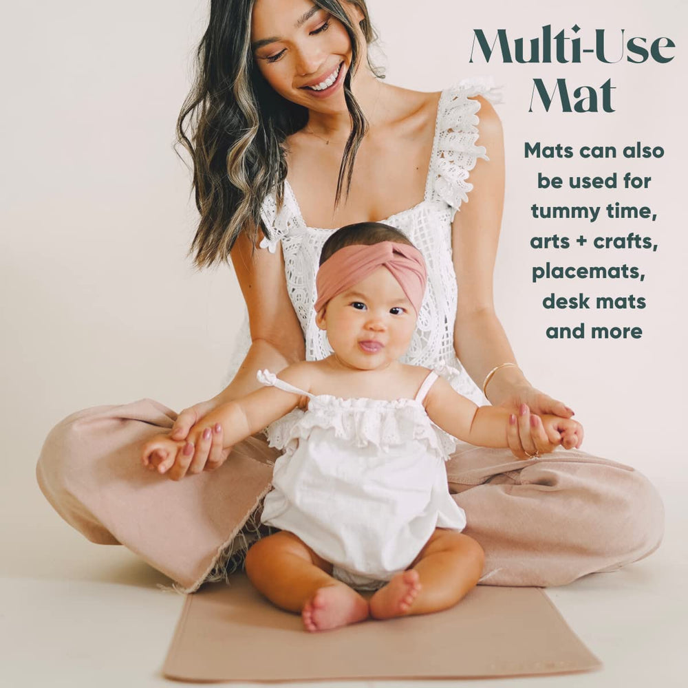 AVA + OLIVER vegan leather changing mat in cream in stroller for quick changes