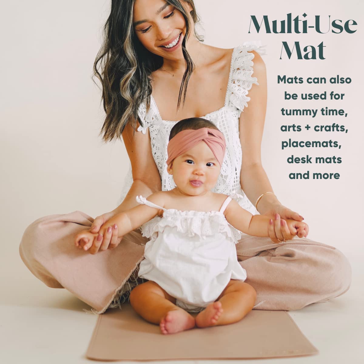 AVA + OLIVER vegan leather changing mat in use for diaper change