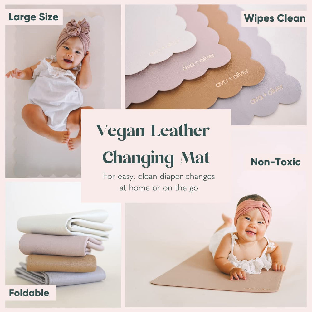 AVA + OLIVER soft-touch vegan leather changing mat laid out for newborn to toddler use