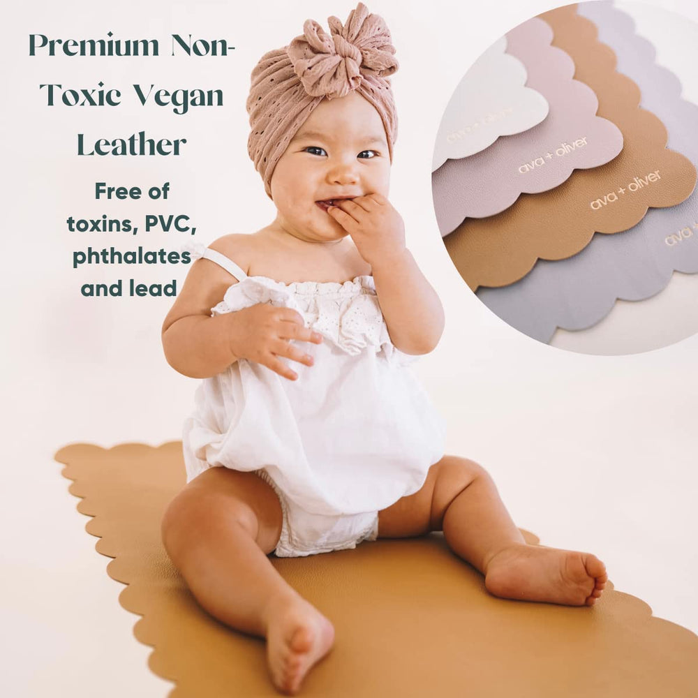 Surface close-up of AVA + OLIVER wipeable vegan leather changing mat for quick cleanup