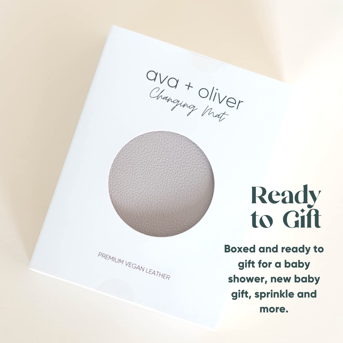 Compact, wipeable AVA + OLIVER changing mat ideal for busy parents