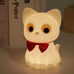 AVEKI cat night light bow glows softly for bedtime.
