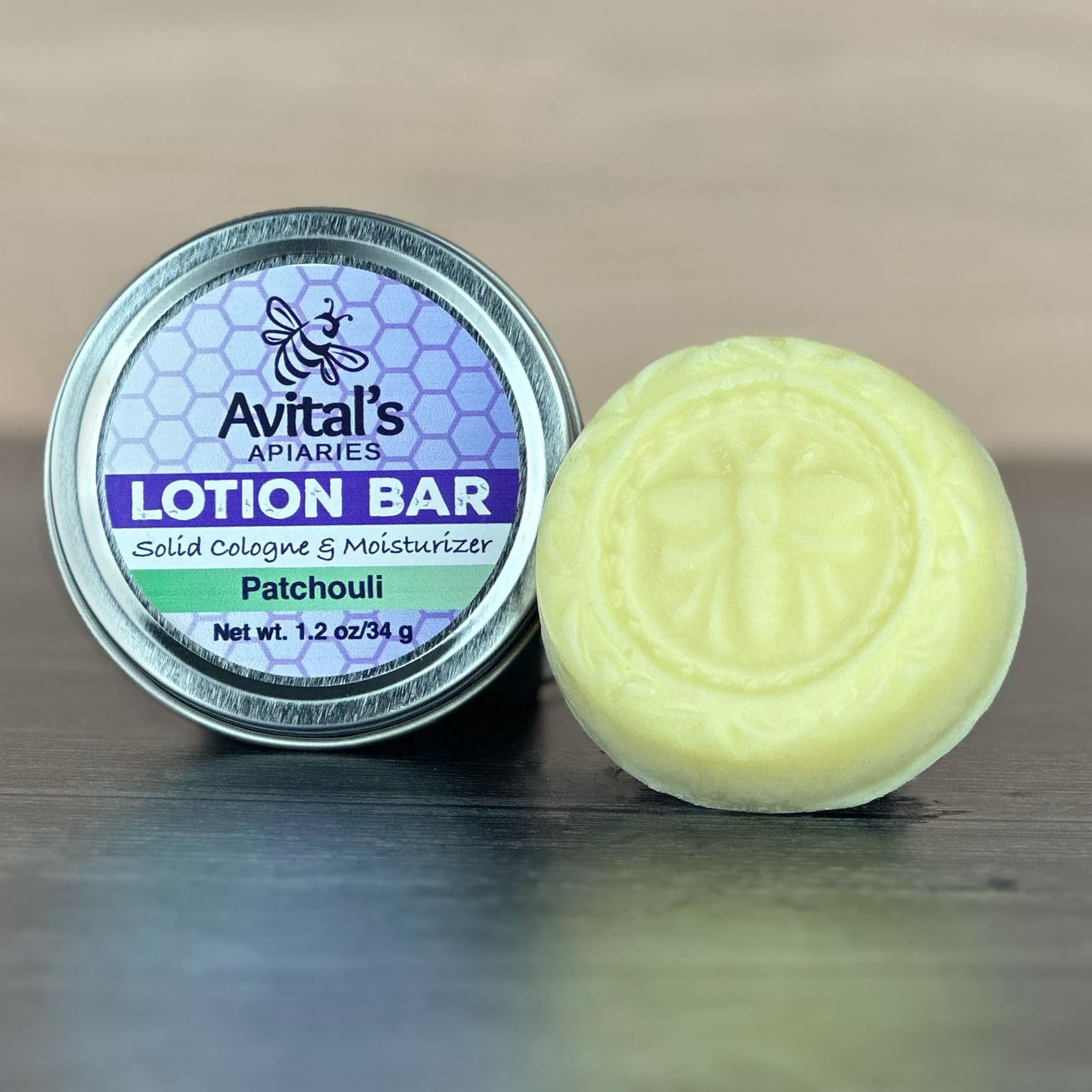 Avital's Patchouli Lotion Bar in tin highlights sustainable, reusable packaging