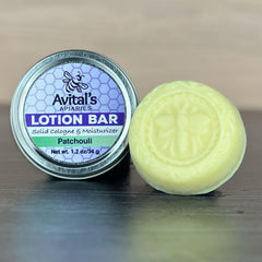 Avital's Patchouli Lotion Bar in tin highlights sustainable, reusable packaging