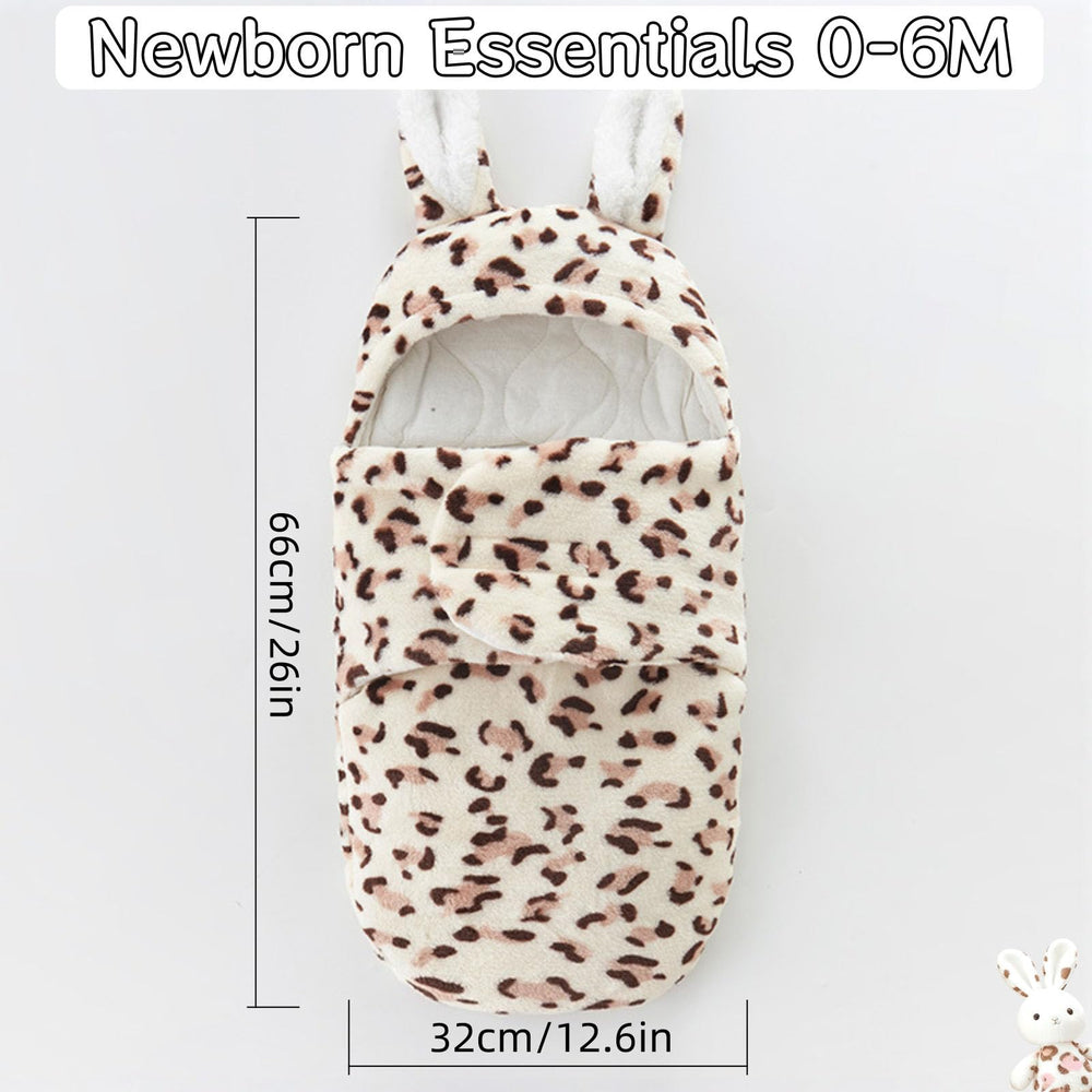 AWSOLAR transitional swaddle cow black-and-white design keeps baby comfortable during sleep.