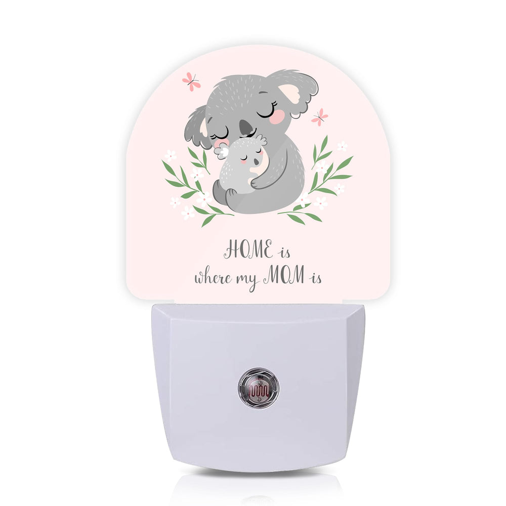 Axxitude koala mom and baby night light plugged in for a gentle kids' room glow.