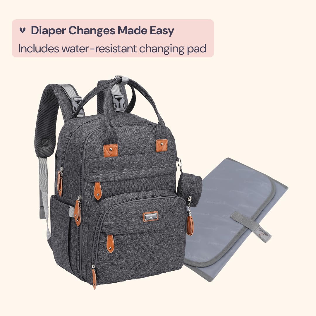 Water-resistant fabric of the BabbleRoo bag protecting contents during light rain.