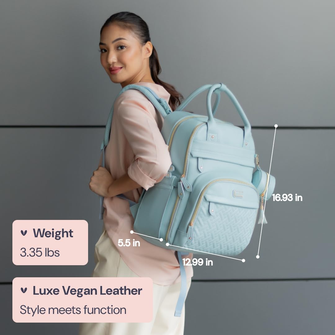 BabbleRoo leather diaper backpack interior layout with multiple pockets and compartments