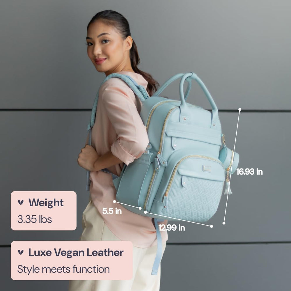 BabbleRoo leather diaper backpack interior layout with multiple pockets and compartments
