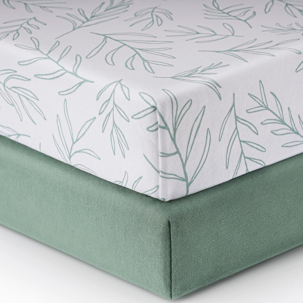 Babebay sage green fitted crib sheet in soft jersey cotton for gentle sleep.