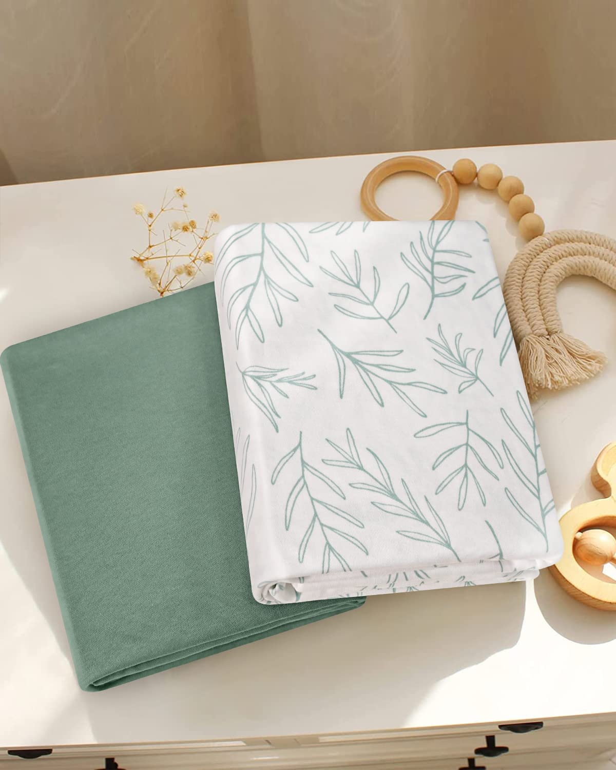 Babebay machine-washable crib sheets simplify busy moms' laundry.