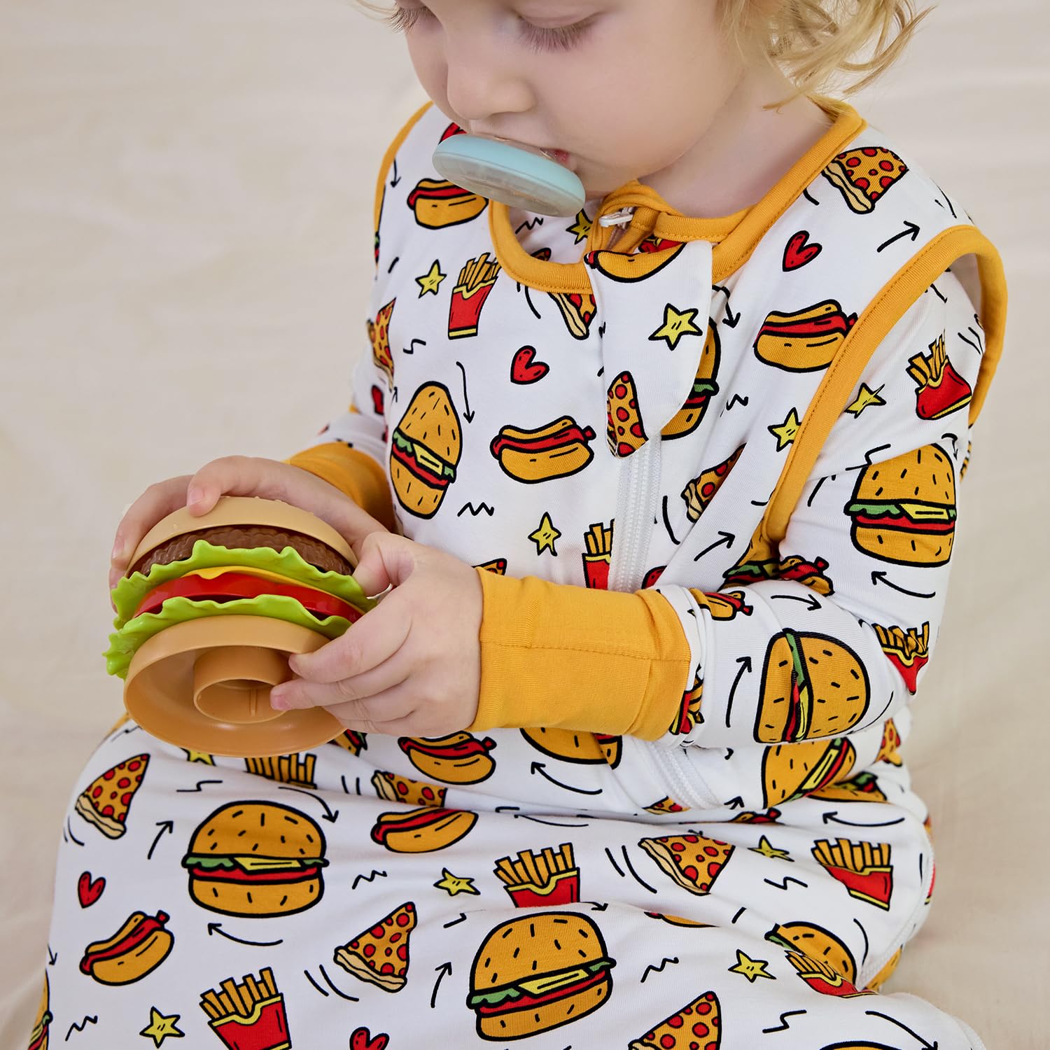 Babee Reshinee sleep sack features enclosed seams for skin-friendly wear.