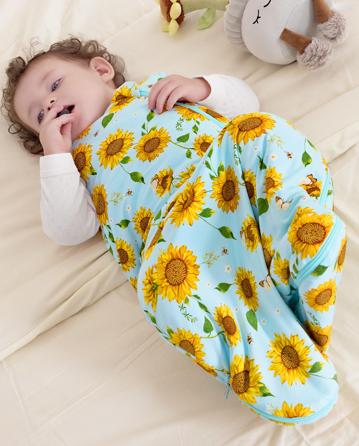 Hand-drawn prints on Babee Reshinee sleep sack add daily charm.