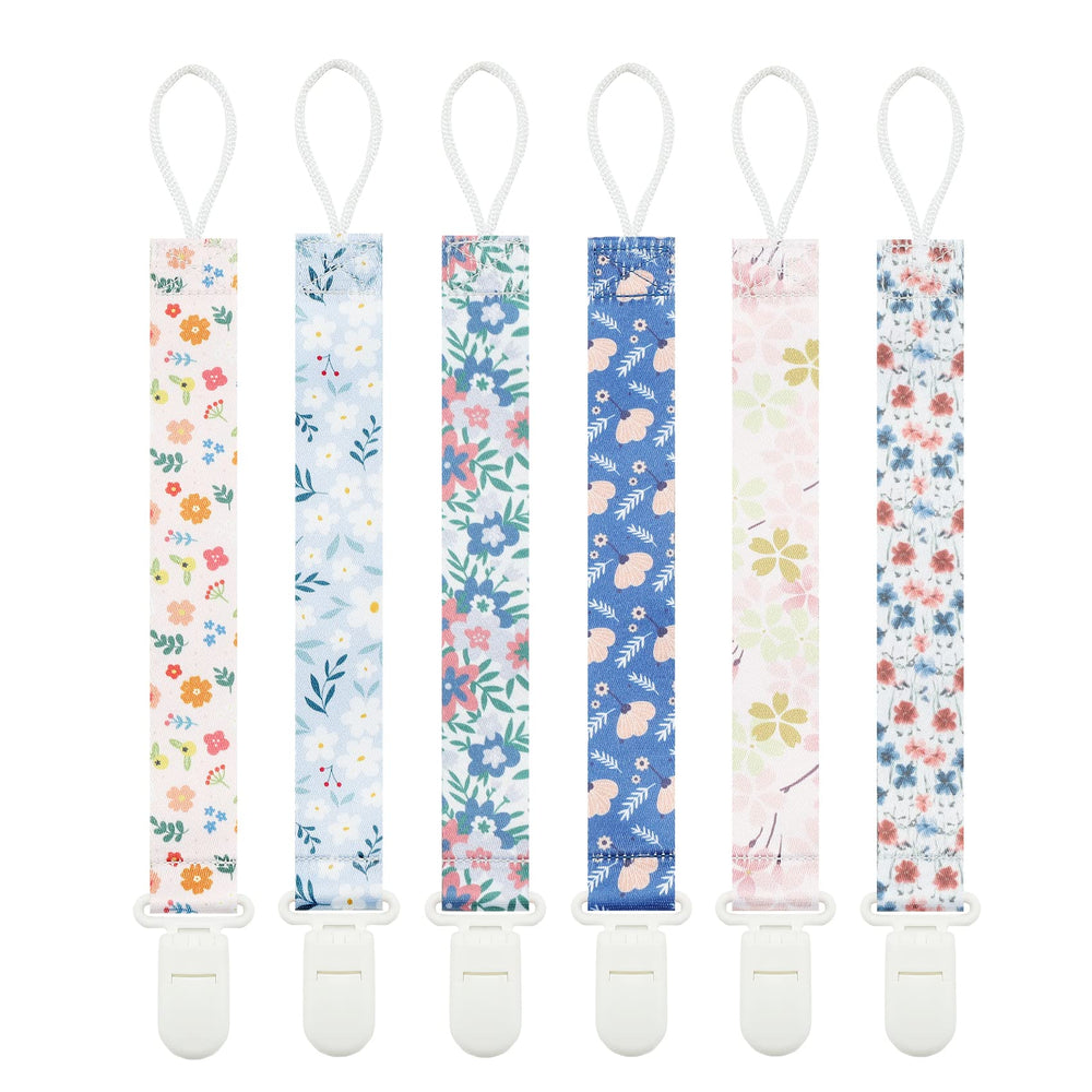 Babeine Floral Pacifier Clip pattern 1 secures a pacifier to clothes for mess-free outings.