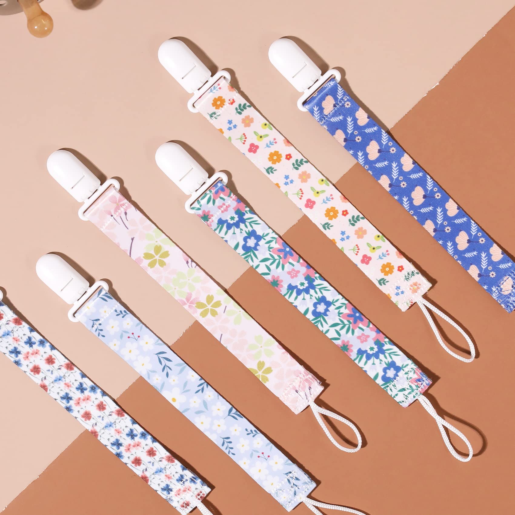 Babeine Floral Pacifier Clip pattern 3 keeps a teether within reach.