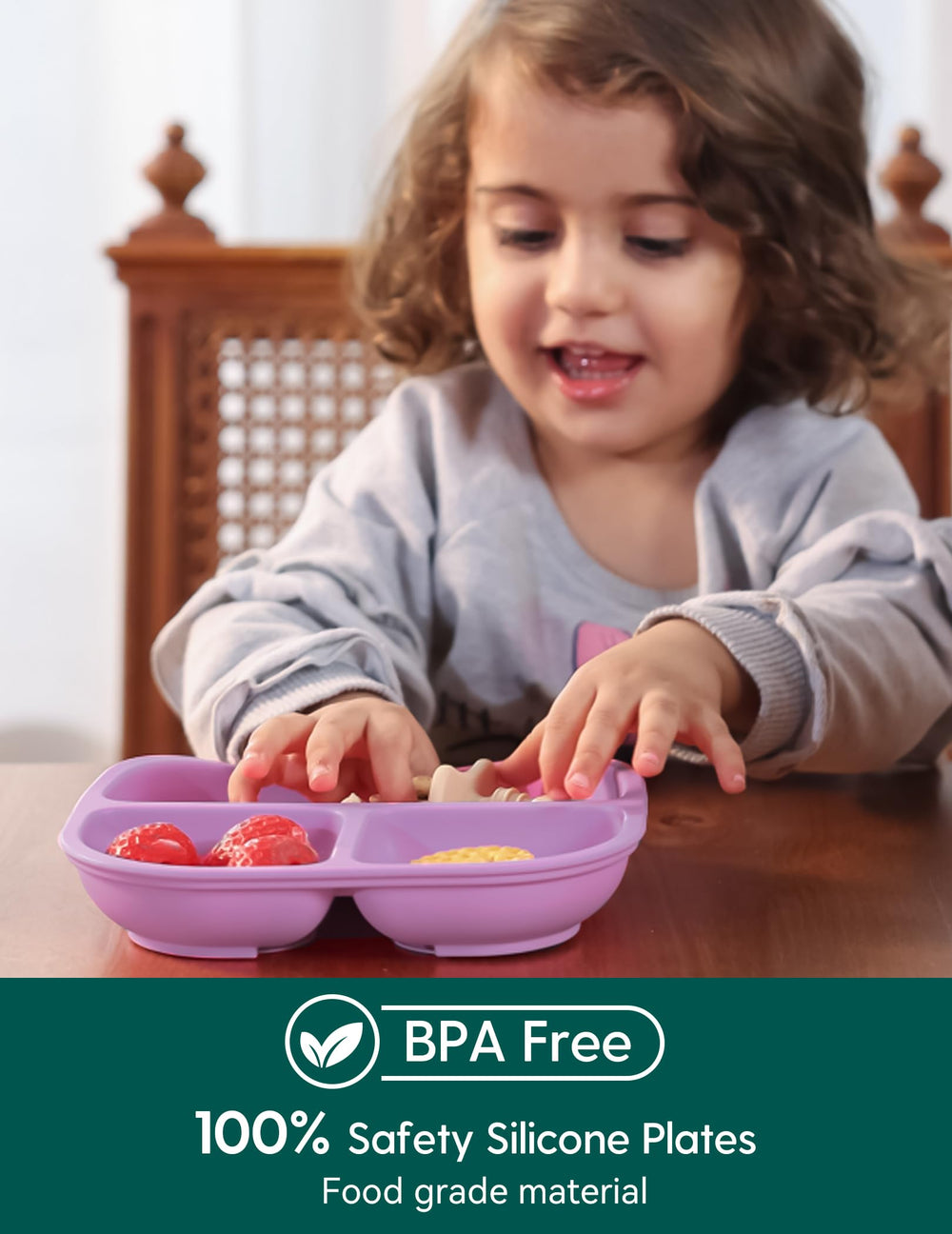 BABELIO baby feeding silicone plate in use by small hands