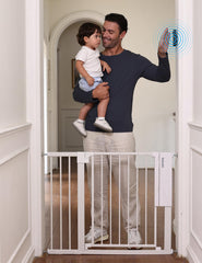 BABELIO smart infrared auto-unlock baby gate in doorway for hands-free access.