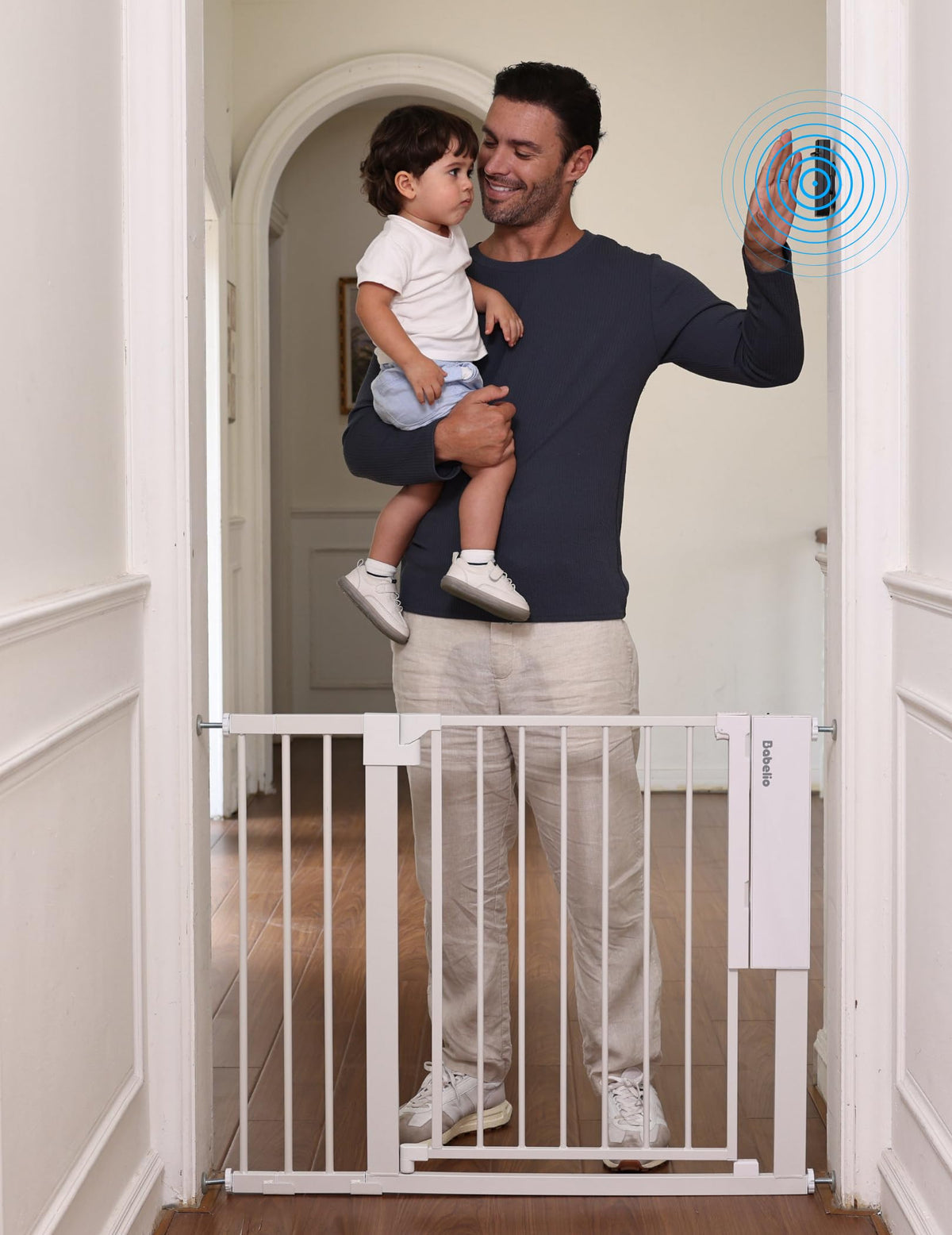 BABELIO Smart Infrared Auto-Unlock Gate front view shows doorway access for a child