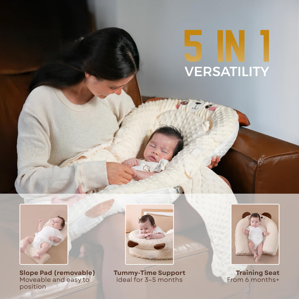 BabieBoo lounger includes carrot and banana toys for sensorimotor play.