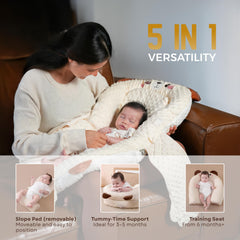 BabieBoo lounger includes carrot and banana toys for sensorimotor play.