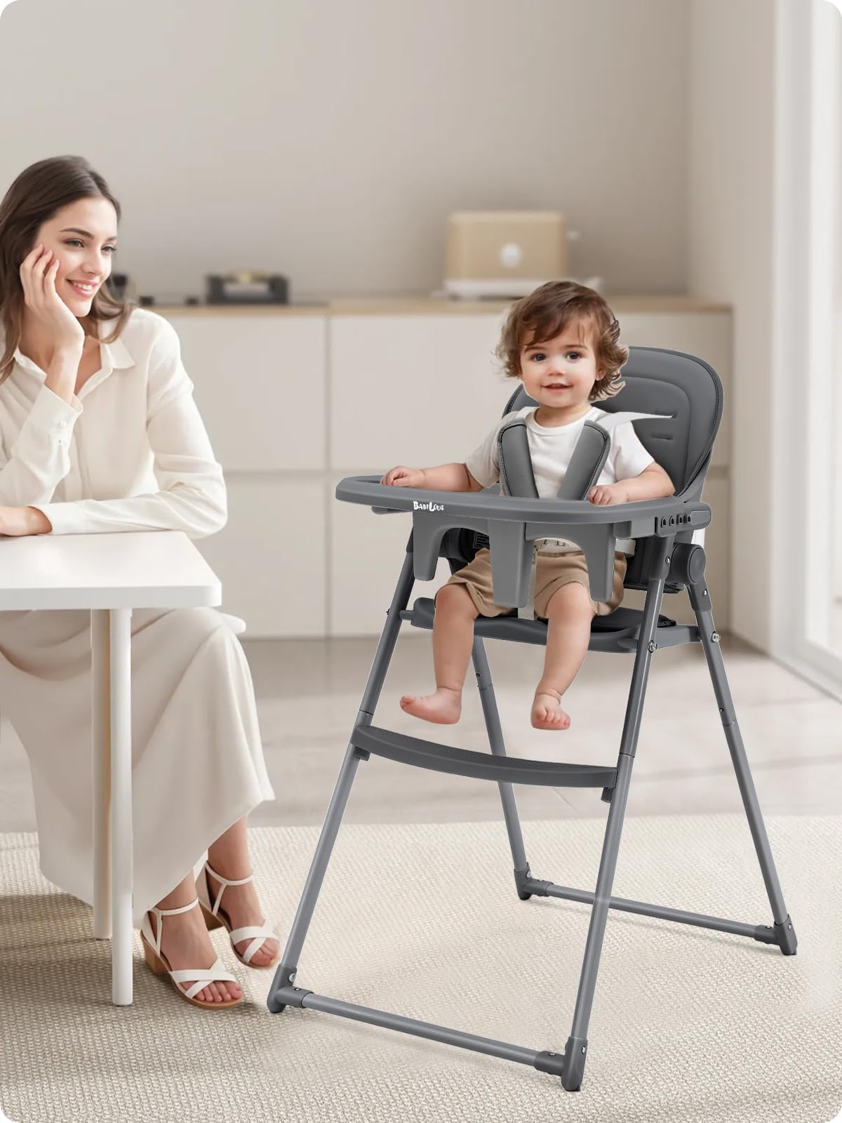 Babilous foldable high chair removable seat and backrest for cleaning.