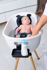 Babu Bath 3-stage convertible tub enabling infant and toddler use.