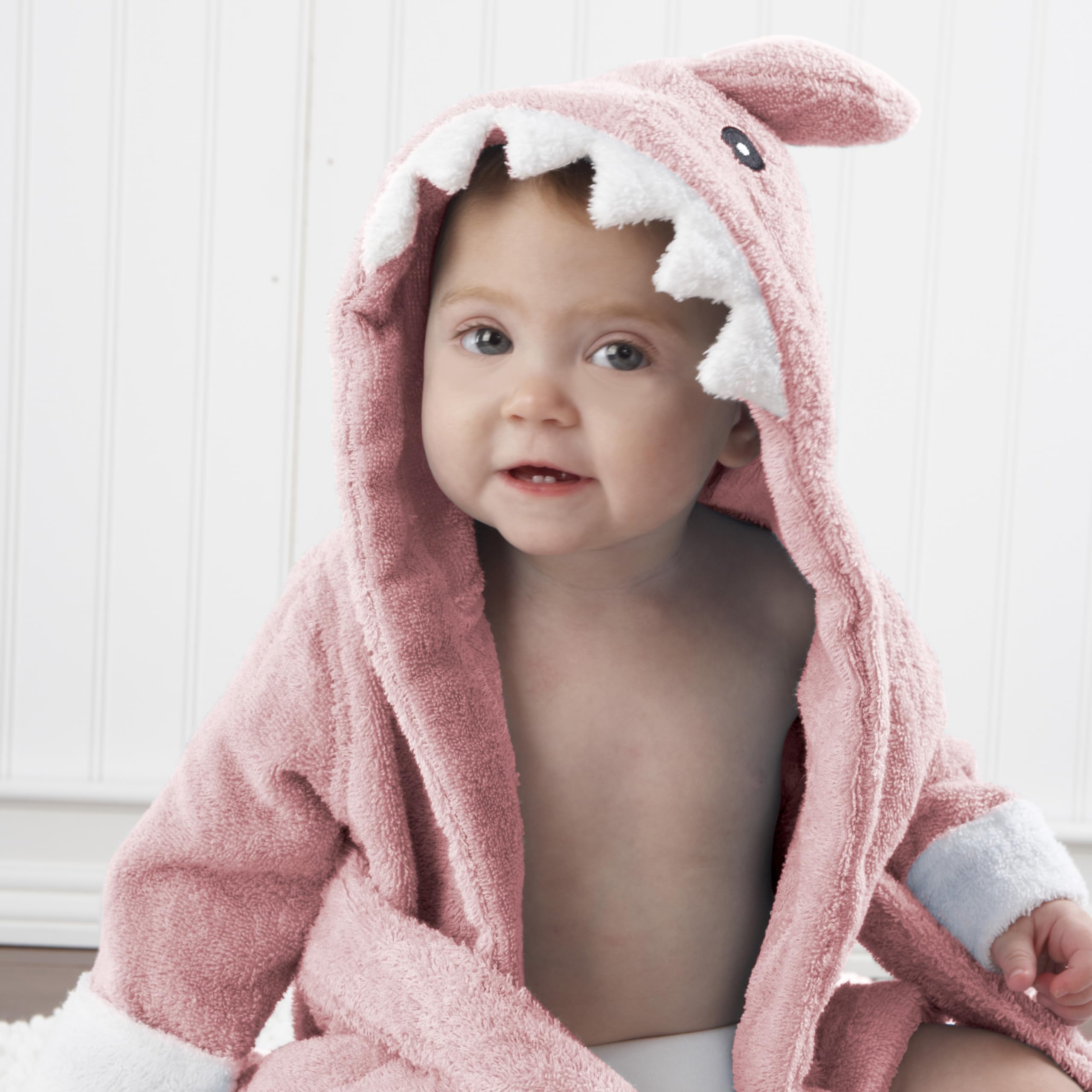 Close-up texture of Baby Aspen pink Baby Shark hooded towel showing plush terry