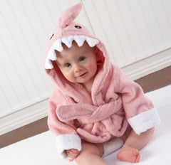 Baby wrapped in Baby Aspen pink Baby Shark hooded towel after bath