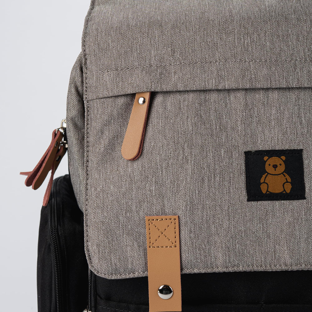 Baby Bliss Alexander diaper bag backpack with insulated bottle holders for on-the-go bottles.