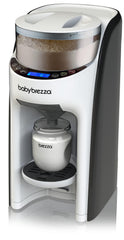 Baby Brezza Formula Pro Advanced machine speeds up bottle prep in a clean kitchen