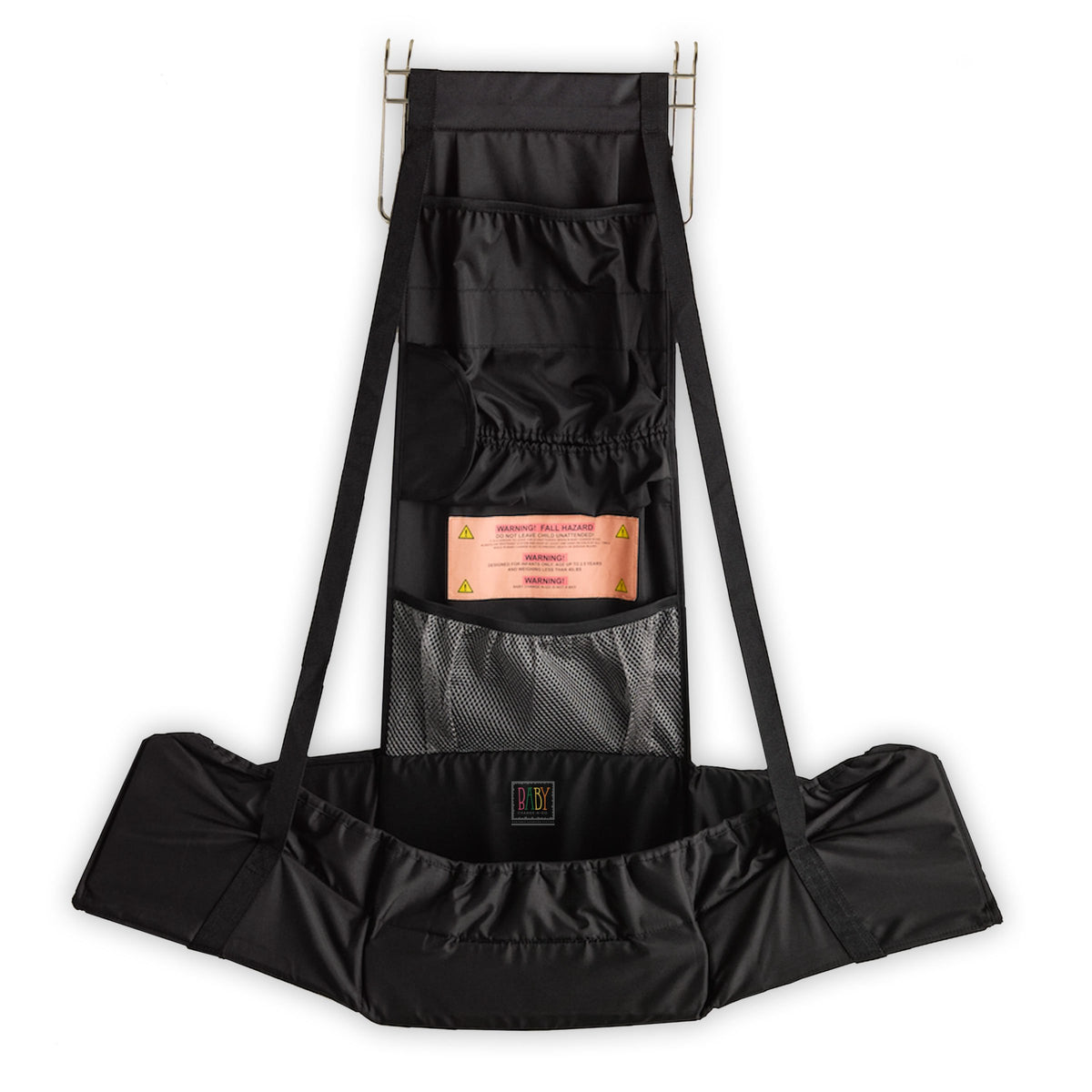 Baby Change-N-Go travel station shown over a door for private diaper changes.