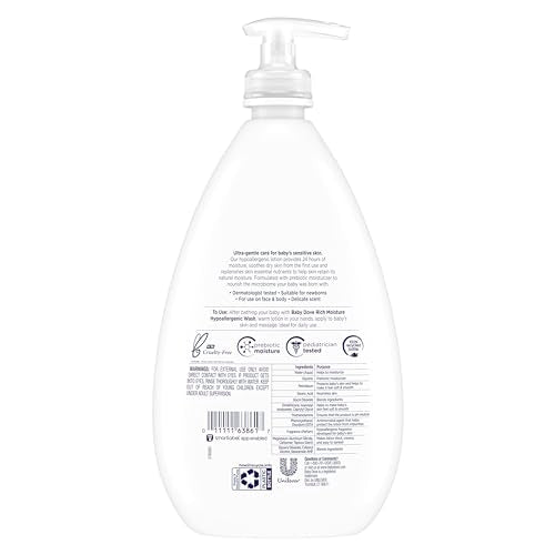 Baby Dove lotion applied to a newborn arm for gentle, lasting moisture after bath.