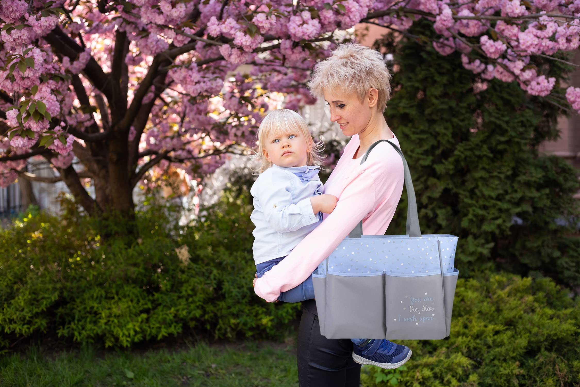 Baby Essentials Diaper Bag Tote showing external wipes pocket for quick access