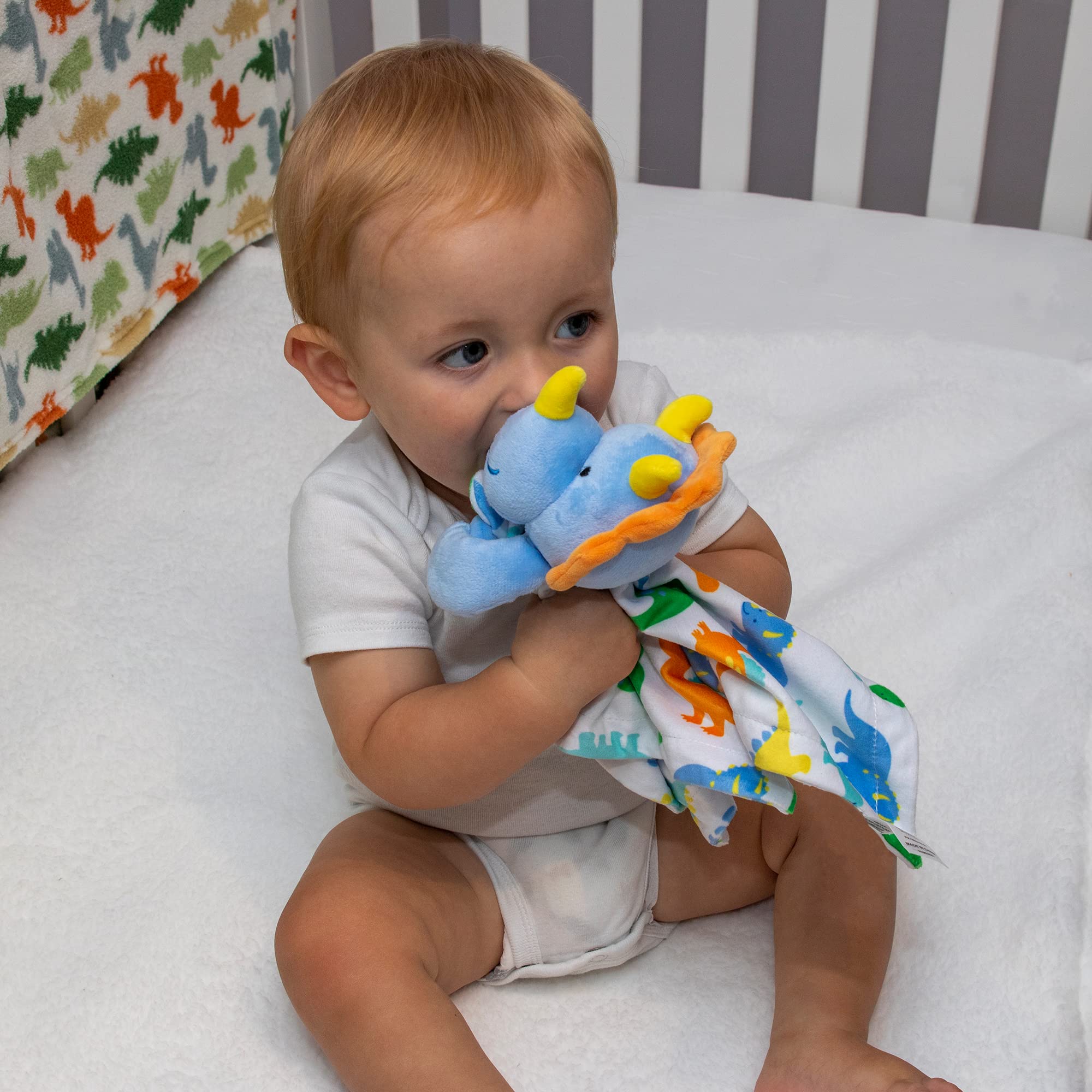Baby Essentials Minky Dino Lovie Dude provides tactile fun and comfort during rest.