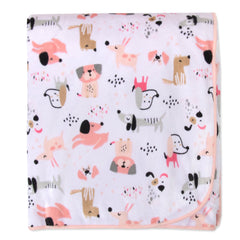 Baby Essentials Puppy Pink blanket in a nursery with reversible design and warmth
