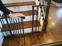Baby Gate Guru spindle rod length demonstrated beside ruler.