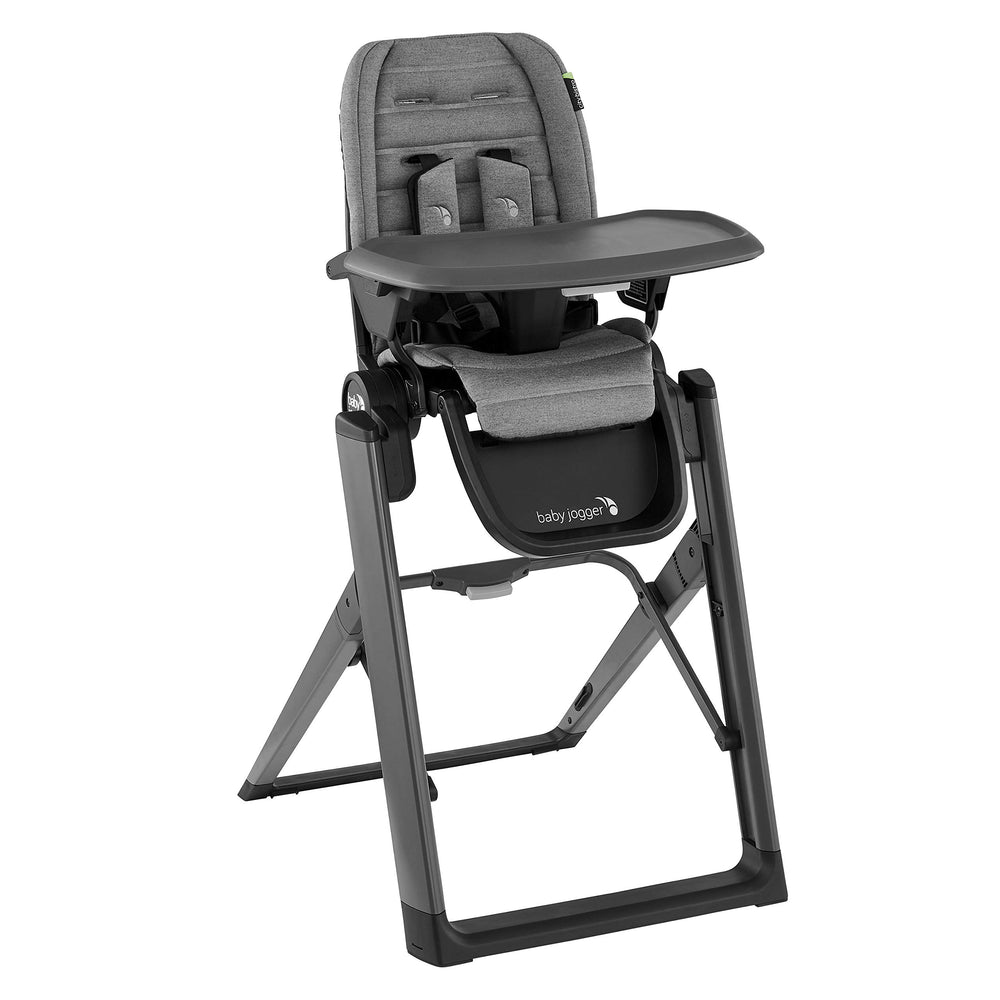 Baby Jogger City Bistro high chair in graphite shows folded footprint for compact storage.