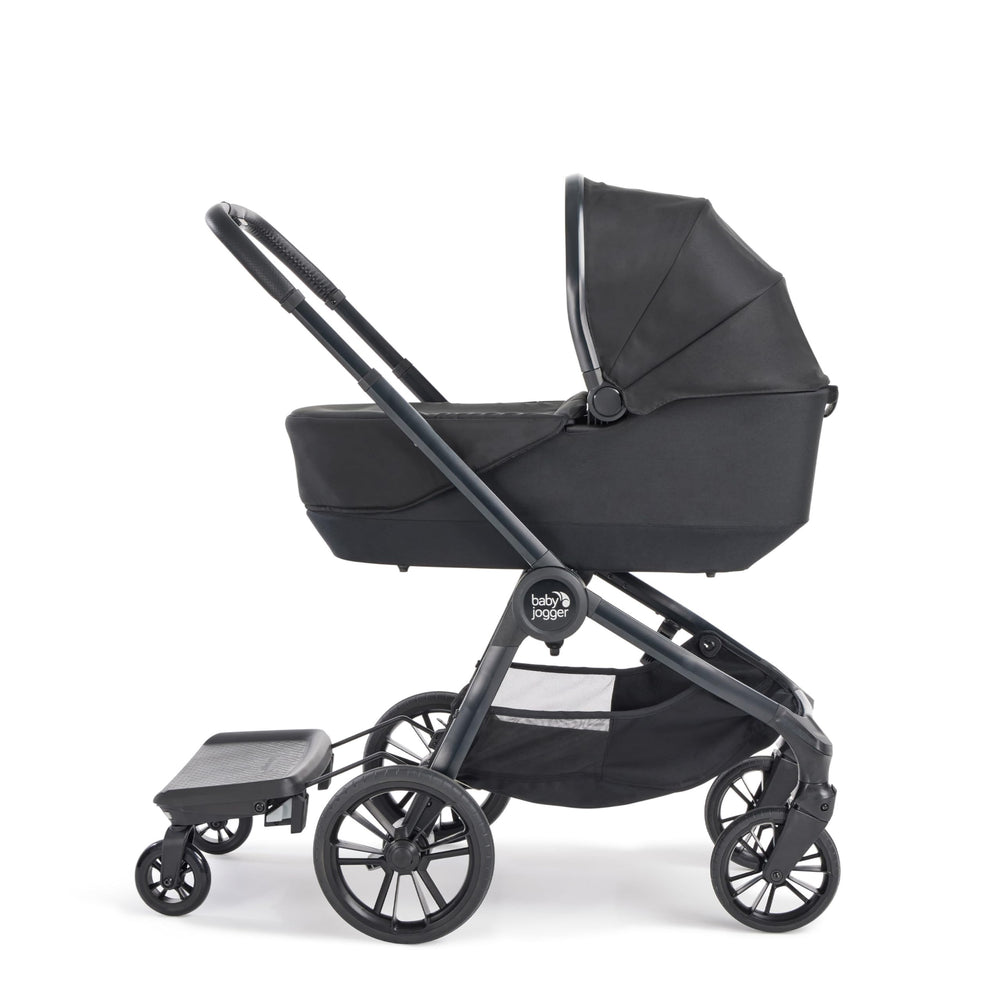 Baby Jogger Glider Board rear-axle attachment enables quick setup on City Mini 2.