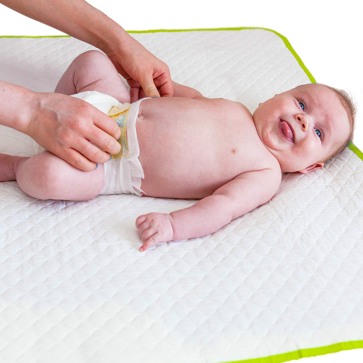 Baby Loovi portable changing pad folded inside the storage bag for travel convenience.