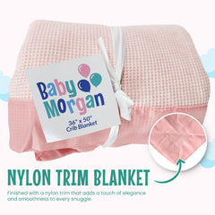 Baby Morgan blanket soft texture close-up highlights gentle touch on baby skin.