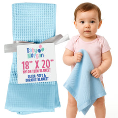 Baby Morgan blue waffle knit blanket with nylon trim offers cozy warmth for baby cuddles.