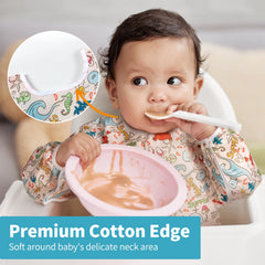 Baby Noah crumb catcher pocket catching spills to protect floors.