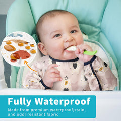 Baby Noah waterproof-sleeved bib material close-up highlighting durable, stain-resistant fabric.