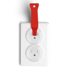 Clear Baby Proof Me outlet covers installed on sockets blend with decor.