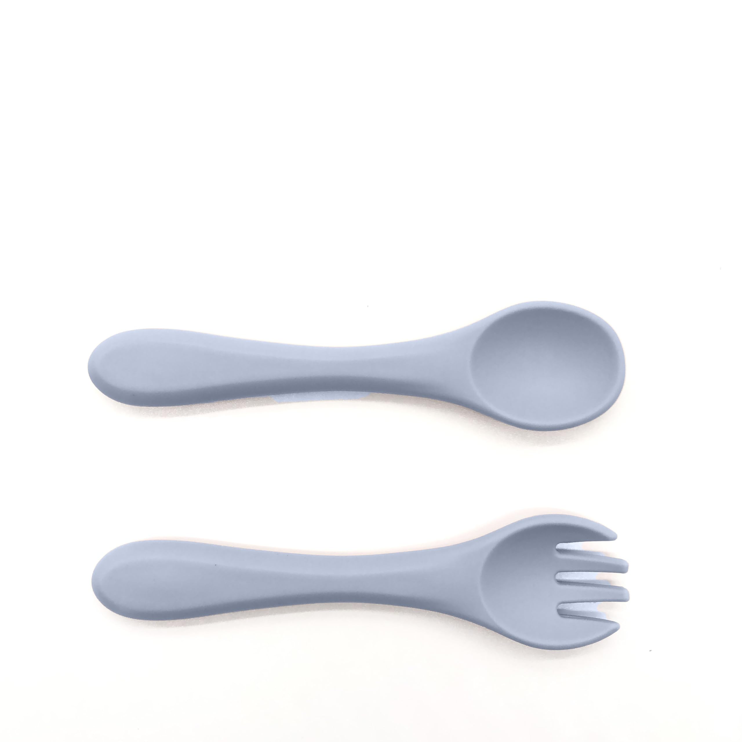 Spoons and forks set sized for tiny hands during self-feeding.
