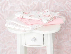 Baby Starters swaddle blanket in use for nursing and soothing at home.