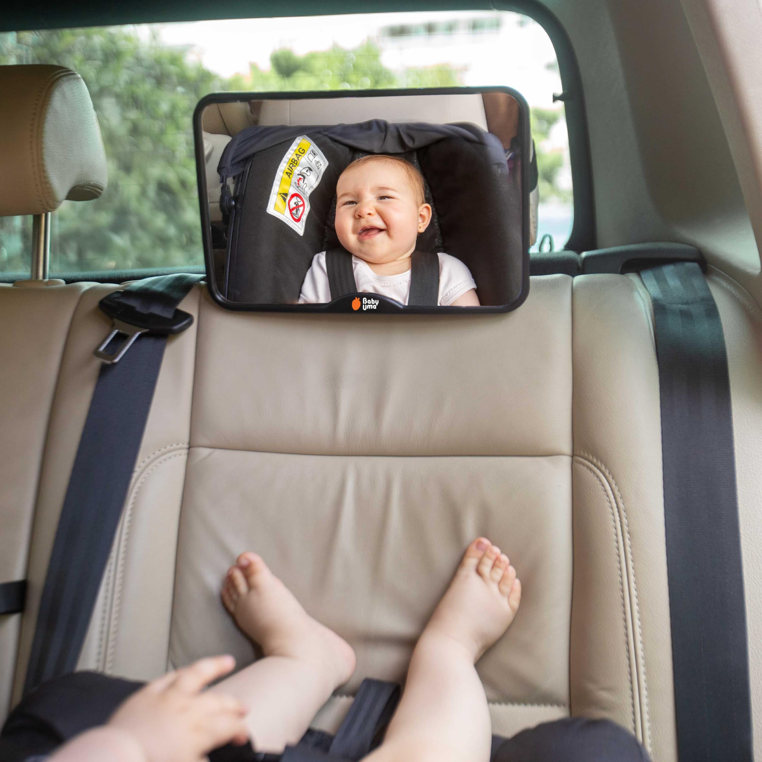 Baby Uma road-trip ready mirror aids attentive supervision on errands.