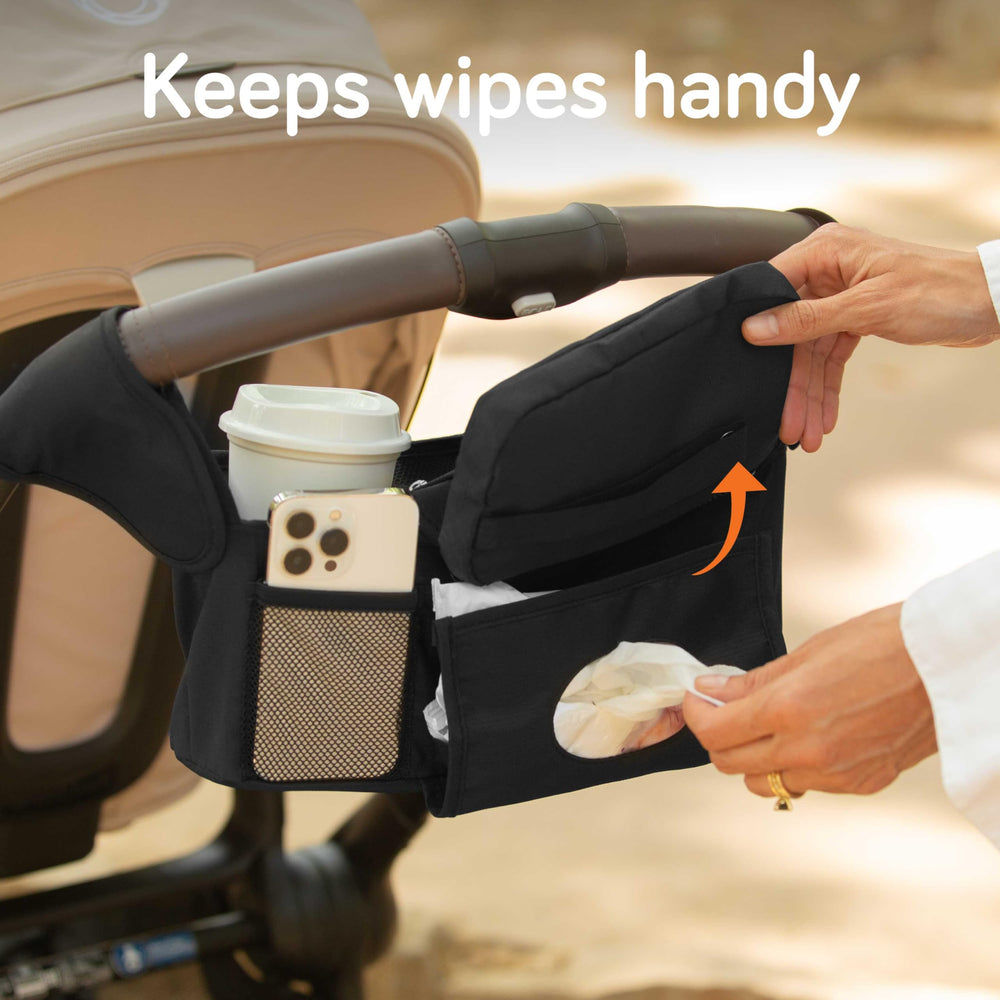 Baby Uma stroller clip-on shoulder strap attachment for flexible carrying.